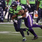SEATTLE, WASHINGTON - OCTOBER 11: Russell Wilson #3 of the Seattle Seahawks is sacked by Eric Wilson #50 of the Minnesota Vikings during the second quarter at CenturyLink Field on October 11, 2020 in Seattle, Washington. (Photo by Abbie Parr/Getty Images)