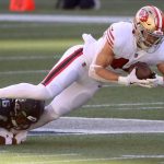 SEATTLE, WASHINGTON - NOVEMBER 01: Kyle Juszczyk #44 of the San Francisco 49ers carries the ball against Jordyn Brooks #56 of the Seattle Seahawks in the first quarter of the game at CenturyLink Field on November 01, 2020 in Seattle, Washington. (Photo by Abbie Parr/Getty Images)