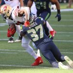 SEATTLE, WASHINGTON - NOVEMBER 01: Brandon Aiyuk #11 of the San Francisco 49ers is hit by Quandre Diggs #37 of the Seattle Seahawks in the first half of the game at CenturyLink Field on November 01, 2020 in Seattle, Washington. (Photo by Abbie Parr/Getty Images)