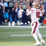 SEATTLE, WASHINGTON - NOVEMBER 01: Quarterback Jimmy Garoppolo #10 of the San Francisco 49ers looks to pass against the Seattle Seahawks in the second quarter of the game at CenturyLink Field on November 01, 2020 in Seattle, Washington. (Photo by Abbie Parr/Getty Images)