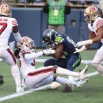 SEATTLE, WASHINGTON - NOVEMBER 01: David Moore #83 of the Seattle Seahawks scores a touchdown  against the San Francisco 49ers in the third quarter of the game at CenturyLink Field on November 01, 2020 in Seattle, Washington. (Photo by Abbie Parr/Getty Images)