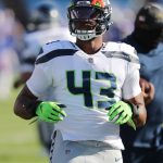 ORCHARD PARK, NEW YORK - NOVEMBER 08: Carlos Dunlap II #43 of the Seattle Seahawks looks on during warmups before the game against the Buffalo Bills at Bills Stadium on November 08, 2020 in Orchard Park, New York. (Photo by Timothy T Ludwig/Getty Images)