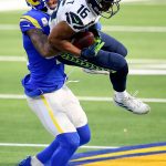 INGLEWOOD, CALIFORNIA - NOVEMBER 15: Tyler Lockett #16 of the Seattle Seahawks is tackled by John Johnson #43 of the Los Angeles Rams after making a catch in the first quarter at SoFi Stadium on November 15, 2020 in Inglewood, California. (Photo by Kevork Djansezian/Getty Images)