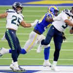 INGLEWOOD, CALIFORNIA - NOVEMBER 15: Quarterback Russell Wilson #3 of the Seattle Seahawks throws under pressure by Leonard Floyd #54 of the Los Angeles Rams in the second quarter at SoFi Stadium on November 15, 2020 in Inglewood, California. (Photo by Harry How/Getty Images)