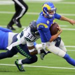 INGLEWOOD, CALIFORNIA - NOVEMBER 15: Quarterback Jared Goff #16 of the Los Angeles Rams is sacked by Jamal Adams #33 of the Seattle Seahawks in the second quarter at SoFi Stadium on November 15, 2020 in Inglewood, California. (Photo by Joe Scarnici/Getty Images)