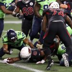 SEATTLE, WASHINGTON - NOVEMBER 19:  Kenyan Drake #41 of the Arizona Cardinals dives in for a touchdown against the Seattle Seahawks at Lumen Field on November 19, 2020 in Seattle, Washington. (Photo by Abbie Parr/Getty Images)