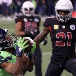 SEATTLE, WASHINGTON - NOVEMBER 19: Tyler Lockett #16 of the Seattle Seahawks catches a pass for a touchdown in front of Patrick Peterson #21 of the Arizona Cardinals at Lumen Field on November 19, 2020 in Seattle, Washington. (Photo by Abbie Parr/Getty Images)