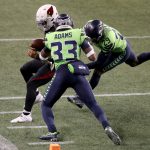 SEATTLE, WASHINGTON - NOVEMBER 19: Kyler Murray #1 of the Arizona Cardinals is pushed out of bounds by Jamal Adams #33 and Jayson Stanley #29 of the Seattle Seahawks at Lumen Field on November 19, 2020 in Seattle, Washington. (Photo by Abbie Parr/Getty Images)