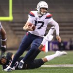 SEATTLE, WASHINGTON - NOVEMBER 21: Grant Gunnell #17 of the Arizona Wildcats runs with the ball in the fourth quarter against the Washington Huskies at Husky Stadium on November 21, 2020 in Seattle, Washington. (Photo by Abbie Parr/Getty Images)