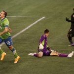 SEATTLE, WASHINGTON - NOVEMBER 24: Jordan Morris #13 of Seattle Sounders celebrates after scoring a goal as Pablo Sisniega #23 (C) and Latif Blessing #7 of Los Angeles FC react in the second half during Round One of the MLS Cup Playoffs at Lumen Field Field on November 24, 2020 in Seattle, Washington. The Sounders took a 3-1 lead on the play. (Photo by Abbie Parr/Getty Images)