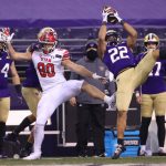 SEATTLE, WASHINGTON - NOVEMBER 28: Trent McDuffie #22 of the Washington Huskies intercepts a pass during the final seconds of play to secure a 24-21 win against the Utah Utes at Husky Stadium on November 28, 2020 in Seattle, Washington. (Photo by Abbie Parr/Getty Images)