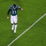 PHILADELPHIA, PENNSYLVANIA - NOVEMBER 30: Carson Wentz #11 of the Philadelphia Eagles reacts as he walks to the sidelines after a three and out against the Seattle Seahawks during the first quarter at Lincoln Financial Field on November 30, 2020 in Philadelphia, Pennsylvania. (Photo by Mitchell Leff/Getty Images)