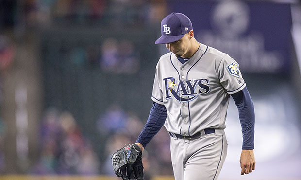 Tampa Bay Rays' pitcher Blake Snell stands between Los Angeles