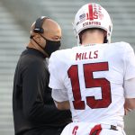 SEATTLE, WASHINGTON - DECEMBER 05: Head Coach David Shaw and Davis Mills #15 of the Stanford Cardinal have a conversation in the third quarter against the Washington Huskies at Husky Stadium on December 05, 2020 in Seattle, Washington. (Photo by Abbie Parr/Getty Images)