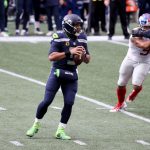SEATTLE, WASHINGTON - DECEMBER 06: Russell Wilson #3 of the Seattle Seahawks looks to pass against the New York Giants during the first quarter in the game at Lumen Field on December 06, 2020 in Seattle, Washington. (Photo by Abbie Parr/Getty Images)