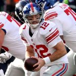 SEATTLE, WASHINGTON - DECEMBER 06: Colt McCoy #12 of the New York Giants looks to hand off the ball against the Seattle Seahawks during the first quarter in the game at Lumen Field on December 06, 2020 in Seattle, Washington. (Photo by Abbie Parr/Getty Images)