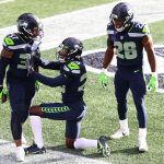 SEATTLE, WASHINGTON - DECEMBER 06: Quandre Diggs #37 of the Seattle Seahawks celebrates his interception with D.J. Reed #29 and Ugo Amadi #28 against the New York Giants during the first quarter in the game at Lumen Field on December 06, 2020 in Seattle, Washington. (Photo by Abbie Parr/Getty Images)