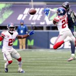 SEATTLE, WASHINGTON - DECEMBER 06: James Bradberry #24 of the New York Giants breaks up a pass intended for DK Metcalf #14 of the Seattle Seahawks during the second quarter in the game at Lumen Field on December 06, 2020 in Seattle, Washington. (Photo by Abbie Parr/Getty Images)