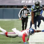 SEATTLE, WASHINGTON - DECEMBER 06: Jabrill Peppers #21 of the New York Giants forces DK Metcalf #14 of the Seattle Seahawks out of bounds during the second quarter at Lumen Field on December 06, 2020 in Seattle, Washington. (Photo by Abbie Parr/Getty Images)