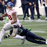 SEATTLE, WASHINGTON - DECEMBER 06: Evan Engram #88 of the New York Giants catches a pass against the Seattle Seahawks during the fourth quarter in the game at Lumen Field on December 06, 2020 in Seattle, Washington. (Photo by Abbie Parr/Getty Images)