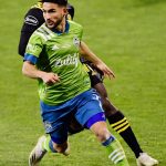 COLUMBUS, OHIO - DECEMBER 12: Cristian Roldan #7 of Seattle Sounders runs the ball past Gyasi Zardes #11 of Columbus Crew in the first half during the MLS Cup Final at MAPFRE Stadium on December 12, 2020 in Columbus, Ohio. (Photo by Emilee Chinn/Getty Images)