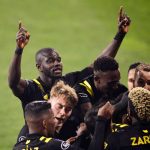 COLUMBUS, OHIO - DECEMBER 12: Jonathan Mensah #4 of Columbus Crew celebrates his team's goal in the first half during the MLS Cup Final against the Seattle Sounders at MAPFRE Stadium on December 12, 2020 in Columbus, Ohio. (Photo by Emilee Chinn/Getty Images)