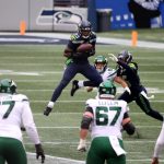 SEATTLE, WASHINGTON - DECEMBER 13: Jamal Adams #33 of the Seattle Seahawks breaks up a pass intended for Braxton Berrios #10 of the New York Jets during the first quarter in the game at Lumen Field on December 13, 2020 in Seattle, Washington. (Photo by Abbie Parr/Getty Images)