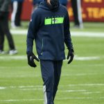 LANDOVER, MARYLAND - DECEMBER 20: Head coach Pete Carroll of the Seattle Seahawks watches his team warm up before the start of their game against the Washington Football Team at FedExField on December 20, 2020 in Landover, Maryland. (Photo by Patrick Smith/Getty Images)