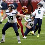 LANDOVER, MARYLAND - DECEMBER 20: Kicker Jason Myers #5 of the Seattle Seahawks follows his first half field goal against the Washington Football Team at FedExField on December 20, 2020 in Landover, Maryland. (Photo by Patrick Smith/Getty Images)