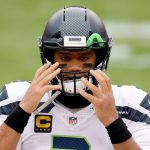 LANDOVER, MARYLAND - DECEMBER 20: Quarterback Russell Wilson #3 of the Seattle Seahawks takes the field before the start of their game against the Washington Football Team at FedExField on December 20, 2020 in Landover, Maryland. (Photo by Tim Nwachukwu/Getty Images)