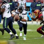 LANDOVER, MARYLAND - DECEMBER 20: Quarterback Russell Wilson #3 of the Seattle Seahawks drops back to pass in the first half against the Washington Football Team at FedExField on December 20, 2020 in Landover, Maryland. (Photo by Patrick Smith/Getty Images)
