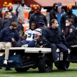 LANDOVER, MARYLAND - DECEMBER 20: Running back DeeJay Dallas #31 of the Seattle Seahawks is carted off the field after being injured in the first half against the Washington Football Team at FedExField on December 20, 2020 in Landover, Maryland. (Photo by Tim Nwachukwu/Getty Images)