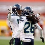 LANDOVER, MARYLAND - DECEMBER 20: Outside linebacker Shaquem Griffin #49 and cornerback Shaquill Griffin #26 of the Seattle Seahawks celebrate their 20-15 win over the Washington Football Team at FedExField on December 20, 2020 in Landover, Maryland. (Photo by Tim Nwachukwu/Getty Images)