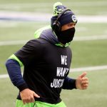 SEATTLE, WASHINGTON - DECEMBER 27: Russell Wilson #3 of the Seattle Seahawks warms up before the game against the Los Angeles Rams at Lumen Field on December 27, 2020 in Seattle, Washington. (Photo by Abbie Parr/Getty Images)