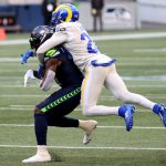 SEATTLE, WASHINGTON - DECEMBER 27: Jalen Ramsey #20 of the Los Angeles Rams breaks up a pass intended for DK Metcalf #14 of the Seattle Seahawks during the second quarter at Lumen Field on December 27, 2020 in Seattle, Washington. (Photo by Abbie Parr/Getty Images)