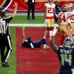 GLENDALE, ARIZONA - JANUARY 03: Wide receiver Tyler Lockett #16 of the Seattle Seahawks reacts after scoring his first of two touchdowns during the fourth quarter against the San Francisco 49ers at State Farm Stadium on January 03, 2021 in Glendale, Arizona. (Photo by Chris Coduto/Getty Images)