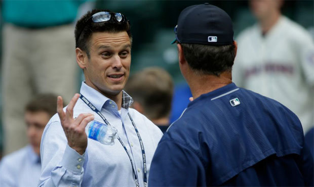 Mariners GM Jerry Dipoto, manager Scott Servais...