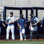 PEORIA, ARIZONA - MARCH 02: Starting pitcher Yusei Kikuchi #18 (second from left) of the Seattle Mariners walks onto the field before the MLB spring training game against the Cleveland Indians on March 02, 2021 in Peoria, Arizona.  The Indians defeated the Mariners 6-1.  (Photo by Christian Petersen/Getty Images)