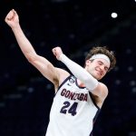 INDIANAPOLIS, INDIANA - MARCH 30: Corey Kispert #24 of the Gonzaga Bulldogs celebrates defeating the USC Trojans 85-66 in the Elite Eight round game of the 2021 NCAA Men's Basketball Tournament at Lucas Oil Stadium on March 30, 2021 in Indianapolis, Indiana. (Photo by Tim Nwachukwu/Getty Images)