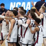 INDIANAPOLIS, INDIANA - MARCH 30: The Gonzaga Bulldogs celebrate defeating the USC Trojans 85-66 in the Elite Eight round game of the 2021 NCAA Men's Basketball Tournament at Lucas Oil Stadium on March 30, 2021 in Indianapolis, Indiana. (Photo by Andy Lyons/Getty Images)