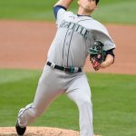 MINNEAPOLIS, MINNESOTA - APRIL 11: Chris Flexen #77 of the Seattle Mariners delivers a pitch against the Minnesota Twins during the first inning of the game at Target Field on April 11, 2021 in Minneapolis, Minnesota. (Photo by Hannah Foslien/Getty Images)