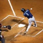 BOSTON, MA - APRIL 23: J.P. Crawford #3 of the Seattle Mariners hits a RBI single in the fourth inning against the Boston Red Sox at Fenway Park on April 23, 2021 in Boston, Massachusetts. (Photo by Kathryn Riley/Getty Images)