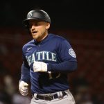 BOSTON, MA - APRIL 23: Kyle Seager #15 of the Seattle Mariners reacts after hitting a three-run home run in the ninth inning against the Boston Red Sox at Fenway Park on April 23, 2021 in Boston, Massachusetts. (Photo by Kathryn Riley/Getty Images)