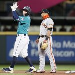 SEATTLE, WASHINGTON - APRIL 02: Luis Torrens #22 of the Seattle Mariners reacts after his double against the San Francisco Giants in the second inning at T-Mobile Park on April 02, 2021 in Seattle, Washington. (Photo by Steph Chambers/Getty Images)