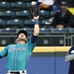 SEATTLE, WASHINGTON - APRIL 02: Mitch Haniger #17 of the Seattle Mariners makes a catch against the San Francisco Giants in the second inning at T-Mobile Park on April 02, 2021 in Seattle, Washington. (Photo by Steph Chambers/Getty Images)