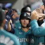 SEATTLE, WASHINGTON - APRIL 02: Ty France #23 of the Seattle Mariners reacts after scoring a run against the San Francisco Giants in the third inning at T-Mobile Park on April 02, 2021 in Seattle, Washington. (Photo by Steph Chambers/Getty Images)