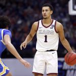 INDIANAPOLIS, INDIANA - APRIL 03: Jalen Suggs #1 of the Gonzaga Bulldogs dribbles against Johnny Juzang #3 of the UCLA Bruins in the second half during the 2021 NCAA Final Four semifinal at Lucas Oil Stadium on April 03, 2021 in Indianapolis, Indiana. (Photo by Jamie Squire/Getty Images)