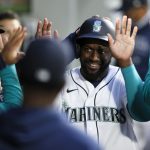 SEATTLE, WASHINGTON - APRIL 03: Taylor Trammell #20 of the Seattle Mariners reacts after his RBI double in the fourth inning against the San Francisco Giants at T-Mobile Park on April 03, 2021 in Seattle, Washington. (Photo by Steph Chambers/Getty Images)
