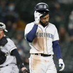 SEATTLE, WASHINGTON - APRIL 05: J.P. Crawford #3 of the Seattle Mariners reacts after he struck out against the Chicago White Sox in the fourth inning at T-Mobile Park on April 05, 2021 in Seattle, Washington. (Photo by Steph Chambers/Getty Images)