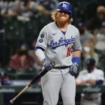 SEATTLE, WASHINGTON - APRIL 19: Justin Turner #10 of the Los Angeles Dodgers reacts after striking out while swinging during the seventh inning against the Seattle Mariners at T-Mobile Park on April 19, 2021 in Seattle, Washington. (Photo by Abbie Parr/Getty Images)